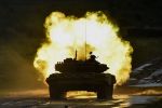 российский танк стреляет